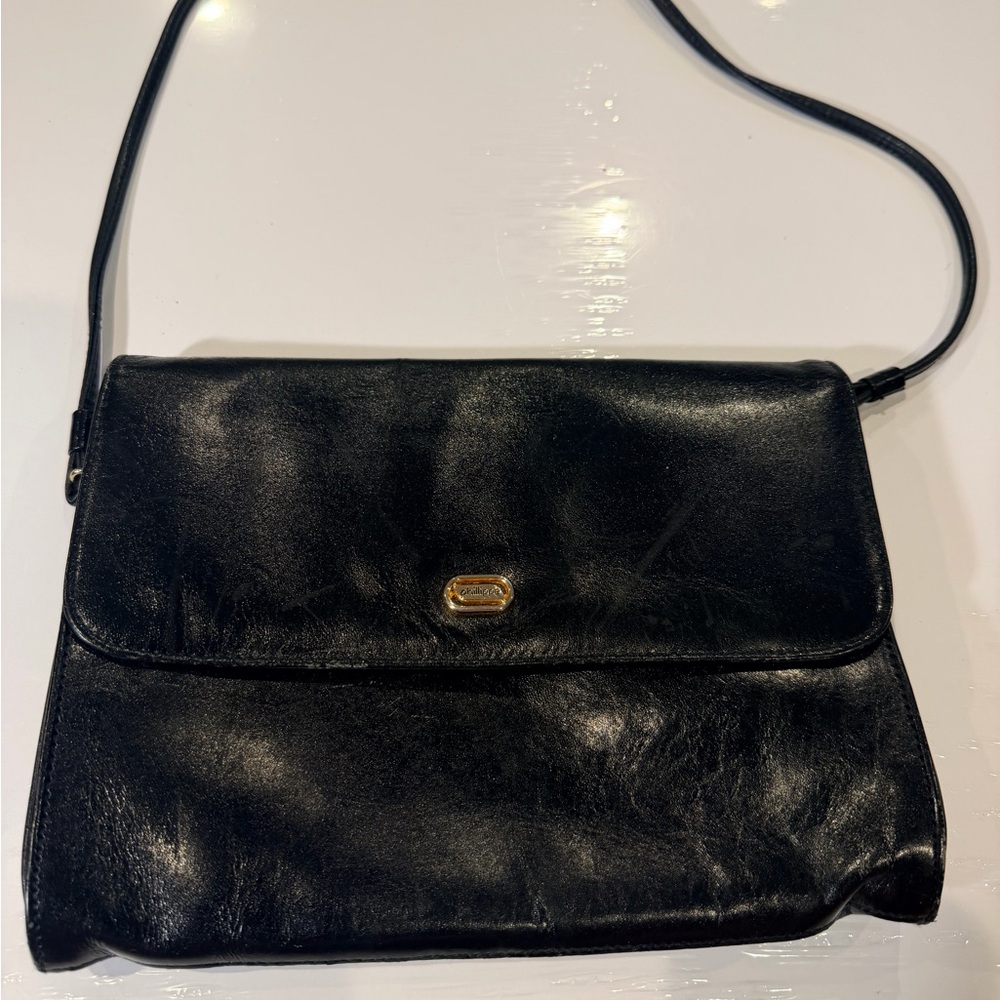 Classic Black Leather Shoulder Bag with Gold Accent